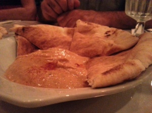 Pita wedges with red bean hummus