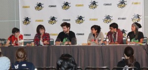 Becca Canote speaking while looking to the rest of the panel
